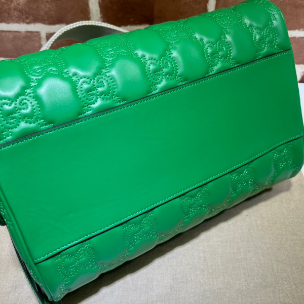 G*u*i gg matelassé leather top handle bag