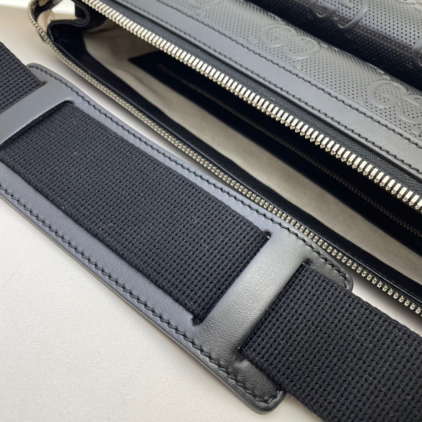 G*u*i gg embossed messenger bag