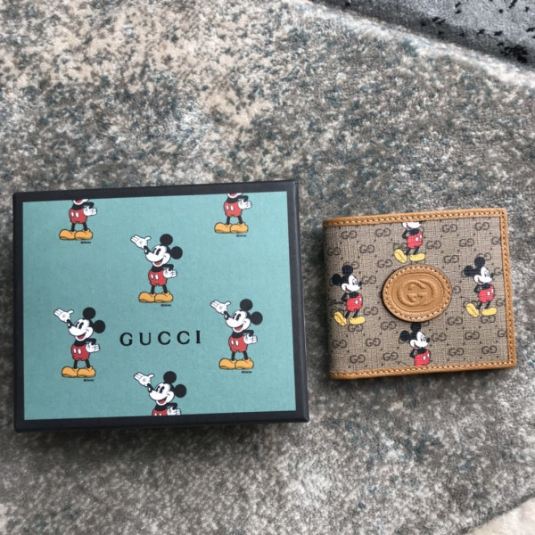 disney x G*u*i gg wallet