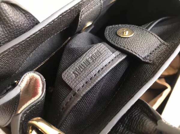 B**rry the small banner in leather and house check