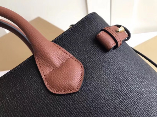 B**rry the medium banner in leather and house check