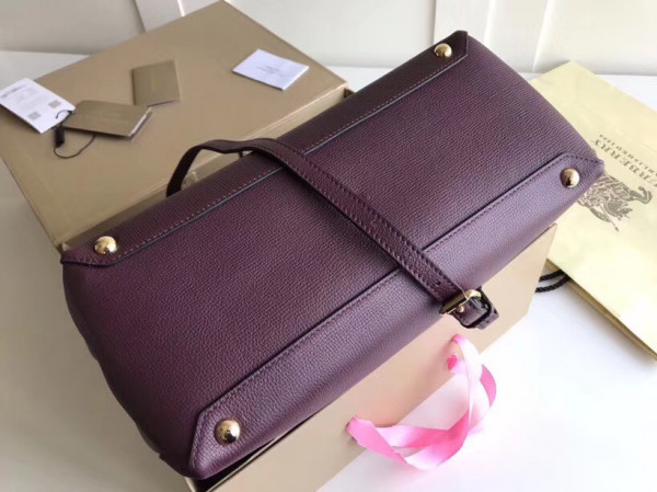 B**rry the medium banner in leather and house check